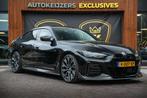 BMW i4 M50 High Executive 84 kWh Carbon Adapt. Cruise HeadUp, Auto's, Zwart, 2190 kg, Vierwielaandrijving, Te koop