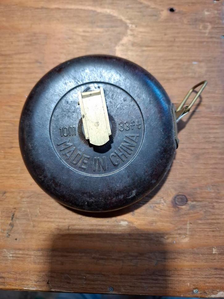 Antieke meetlint. 10 meter. 33 ft. Made in china, Antiek en Kunst, Antiek | Gereedschap en Instrumenten, Ophalen