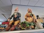 Grote tuinkabouters op bankje, Ophalen