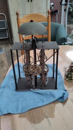 Comtoise dwangslag met bel, Ophalen