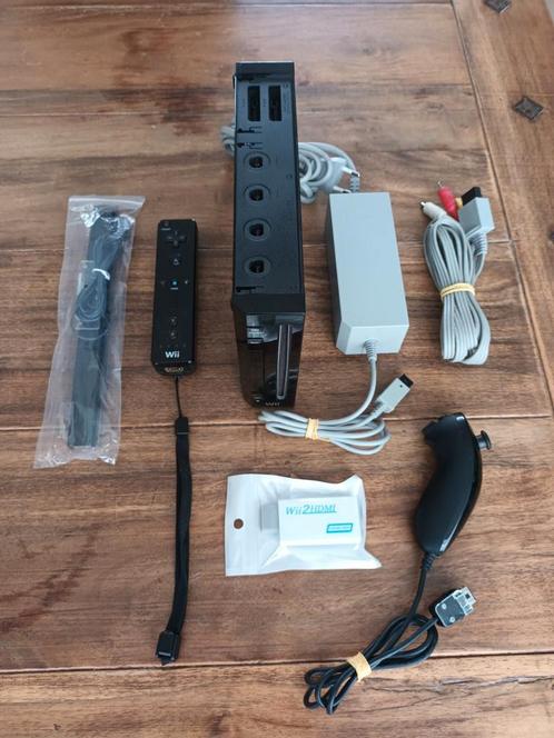 Zwarte Nintendo Wii incl 18 spellen controller Nunchuck HDMI, Spelcomputers en Games, Games | Nintendo Wii, Zo goed als nieuw