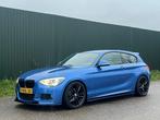 BMW 114i M pakket navi pro, 1-Serie, Achterwielaandrijving, USB, Zwart