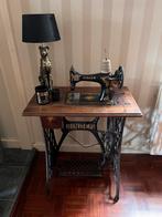 Singer naaimachine met tafel, Ophalen