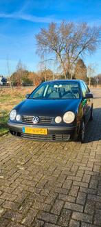 Volkswagen Polo 1.4 55KW 2003 Zwart, Auto's, Voorwielaandrijving, 15 km/l, 4 cilinders, Zwart