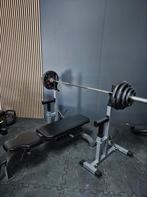 Complete gym met halterset en Taurus steunen en bankje, Ophalen, Zo goed als nieuw, Fitnessbank