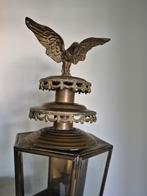 Antieke koetslamp gevel, Ophalen