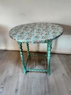 Antiek tafeltje, Ophalen