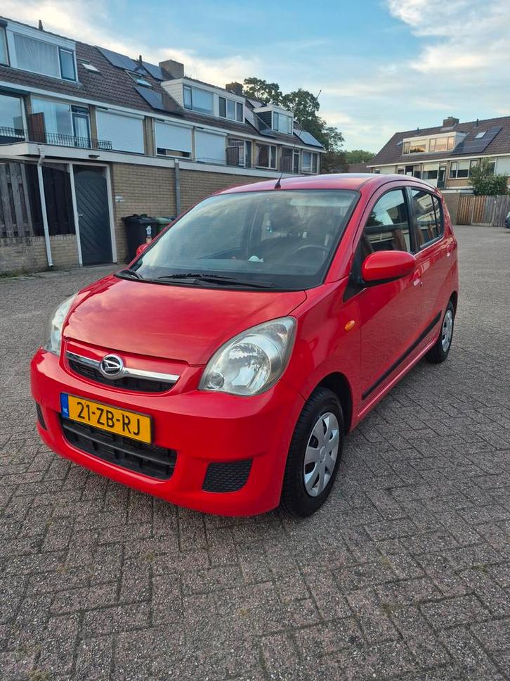 Daihatsu Cuore 1.0 5D 2007 Rood, Auto's, Daihatsu, Particulier, Cuore, ABS, Airconditioning, Elektrische ramen, Isofix, Benzine