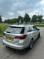 Opel Astra 1.6 Turbo 200pk Sports Tourer Innovation+ 2016, Auto's, Opel, Voorwielaandrijving, Zwart, 1650 kg, Leder
