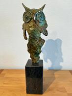 Bronzen Uil Beeld, Ophalen