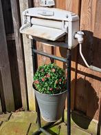 Antieke wringer, Ophalen