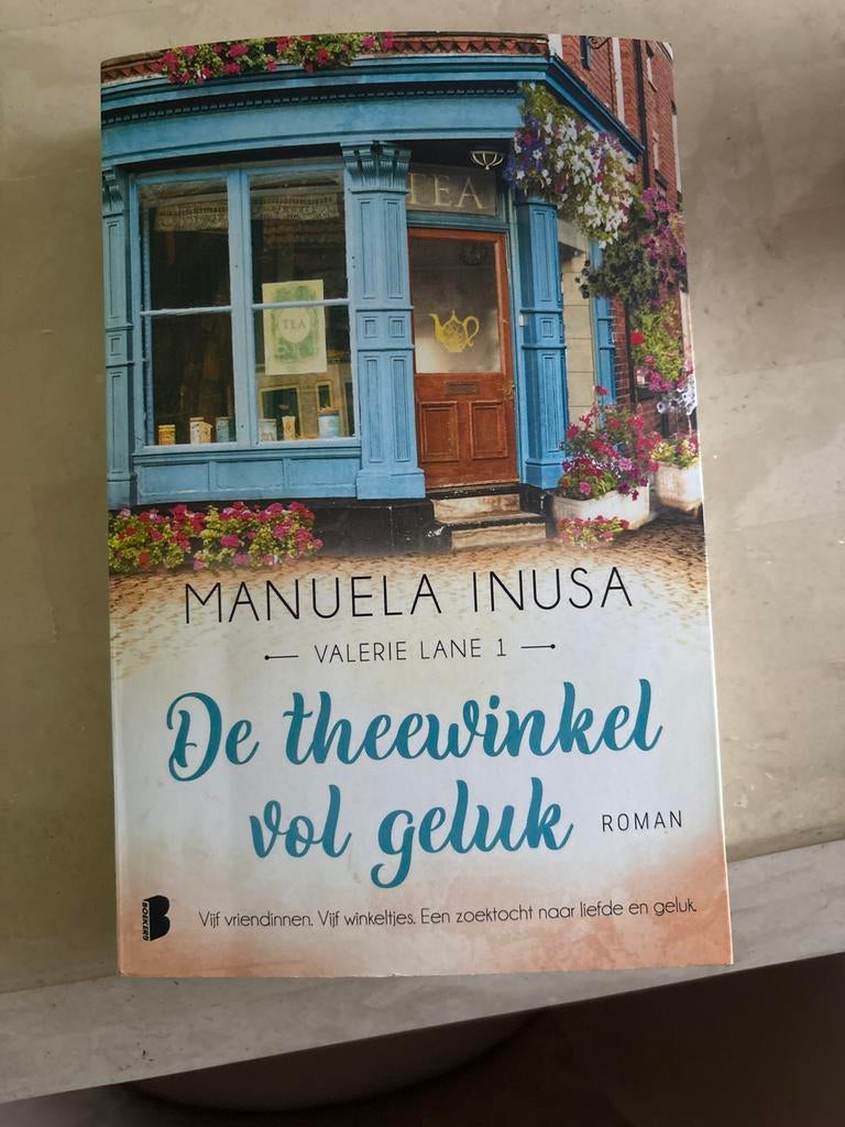 De theewinkel vol geluk - Manuela Inusa, Ophalen of Verzenden, Gelezen, Nederland