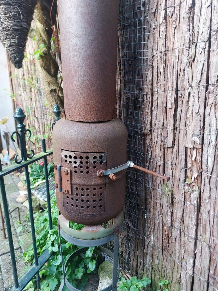 Kleine robuuste houtkachel voor buiten, Ophalen