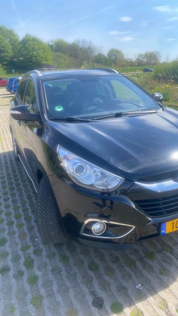 Hyundai iX35 2.0 I Cvvt 2WD AUTMAAT 2012 Zwart, 1998 cc, 4 cilinders, 75 €/maand, Grijs