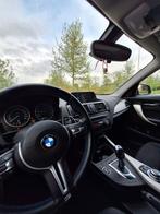 BMW 1-Serie 116i 136PK 5D Aut. 2014 Zwart, 65 €/maand, 4 cilinders, Xenon verlichting, Zwart