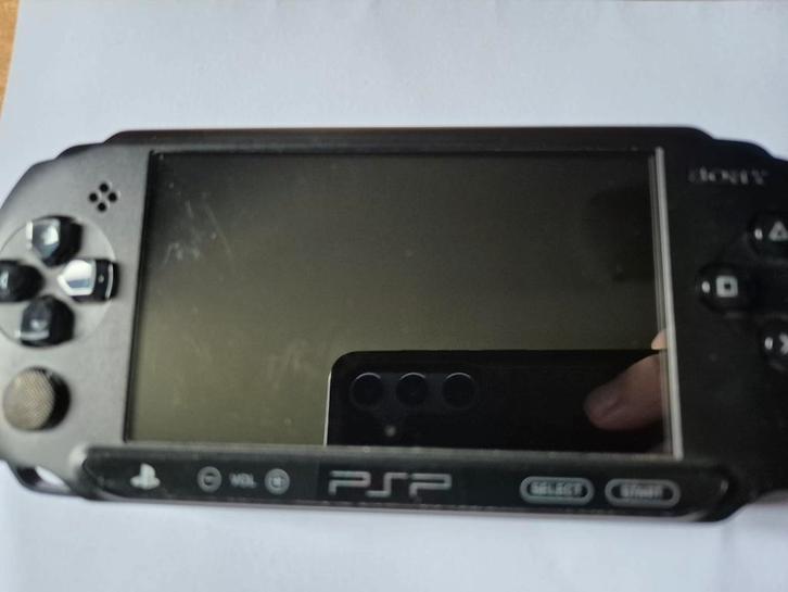 Sony Psp model 1004 met spel., Spelcomputers en Games, Spelcomputers | Sony PSP, Gebruikt, PSP, Zwart, Met games, Ophalen of Verzenden
