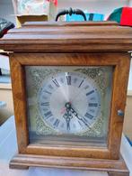 Antieke houten tafelklok, Ophalen