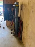 Hefmast voor fruittrekker met lange lepels, Ophalen