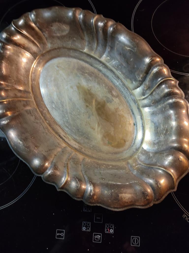 Verzilverde Serveerschaal, Ophalen