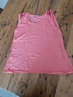 Te koop oranje damestop met op de schouder palletjes, maat L, Kleding | Dames, Tops, Maat 42/44 (L), Oranje, Ophalen of Verzenden