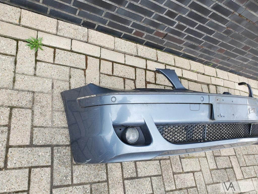 BMW 7 serie E65 facelift voorbumper met pdc  mistlampen €350, Gebruikt, Voor, Ophalen of Verzenden, Bumper
