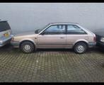 Mazda 323 1.5 aut. 1987 -  bijna wegenbelasting vrij!, Auto's, Mazda, 4 cilinders, 400 kg, Beige, Origineel Nederlands