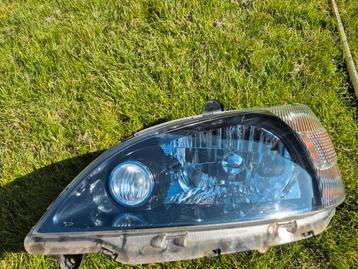 Nette koplampen set voor een Daihatsu YRV beschikbaar voor biedingen