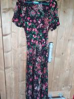 Hot Lava wikkeljurk maat L, Kleding | Dames, Overige kleuren, Ophalen of Verzenden, Gedragen, Onder de knie