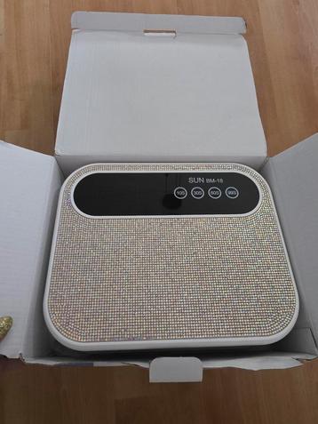 Nieuwe nagellamp uv met timer en diamantjes  beschikbaar voor biedingen