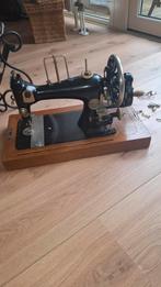 Antieke naaimachine veritas, Ophalen