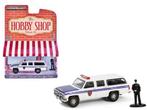 1985 GMC Suburban 2500 van Greenlight 1/64 + police officer, Ophalen of Verzenden, Nieuw, Auto