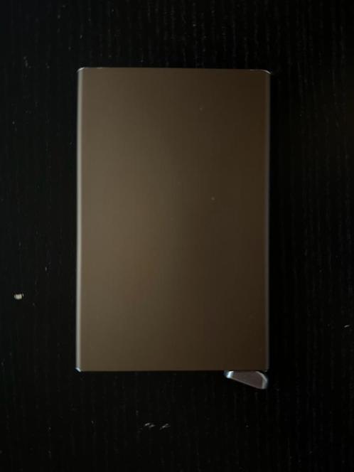 Secrid Premium Cardprotector Bruin, Sieraden, Tassen en Uiterlijk, Portemonnees, Zo goed als nieuw, Overige merken, Bruin, Ophalen of Verzenden