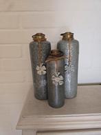 3 oude zinken kruiken, Ophalen