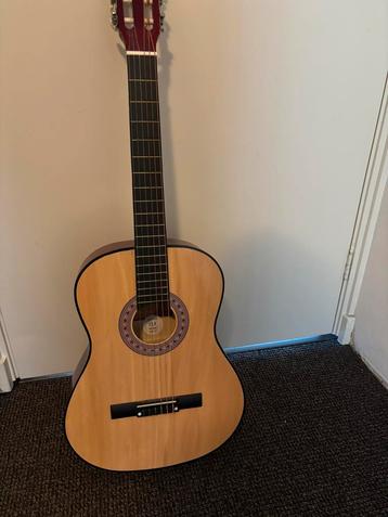 Linkshandige akoestische Gitaar beschikbaar voor biedingen