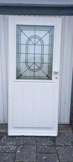 Zware hardhouten voordeur met glas in lood in dubbel glas., Hobby en Vrije tijd, Ophalen