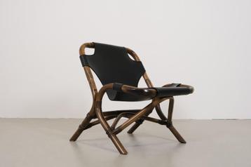 Vintage rotan fauteuil met skai zitting beschikbaar voor biedingen