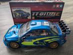 Tamiya Subaru Impreza Rally 1/10 met extra banden, Ophalen of Verzenden, Gebruikt, Auto onroad