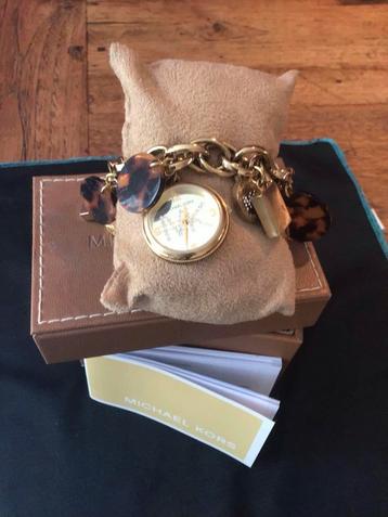Michael Kors Charm Bracelet Horloge beschikbaar voor biedingen