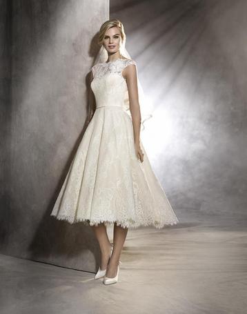 Korte kanten trouwjurk maat 38/40 beschikbaar voor biedingen