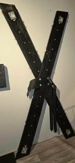 Sint-Andreaskruis en schandpaal, Ophalen