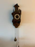 Zaanse klok, Ophalen