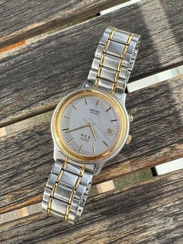 Seiko Quartz AGS Sq100 ….. 5M22-7A70 kinetic beschikbaar voor biedingen