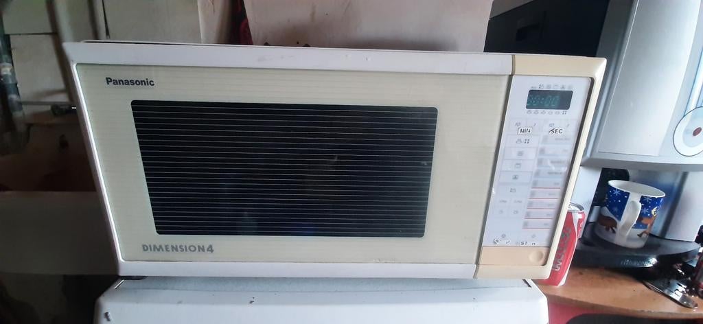 Panasonic NN-8550 Dimension 4, Ophalen, Gebruikt