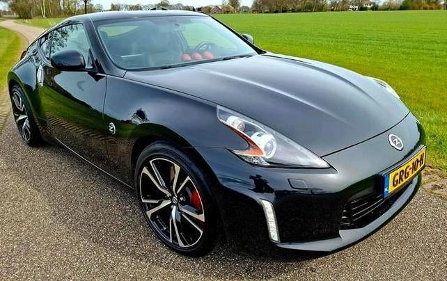 Nissan 370Z 3.7 V6 330pk pack edition coupé 2018 Zwart, Auto's, Automaat, 3696 cc, Achterwielaandrijving, Zwart
