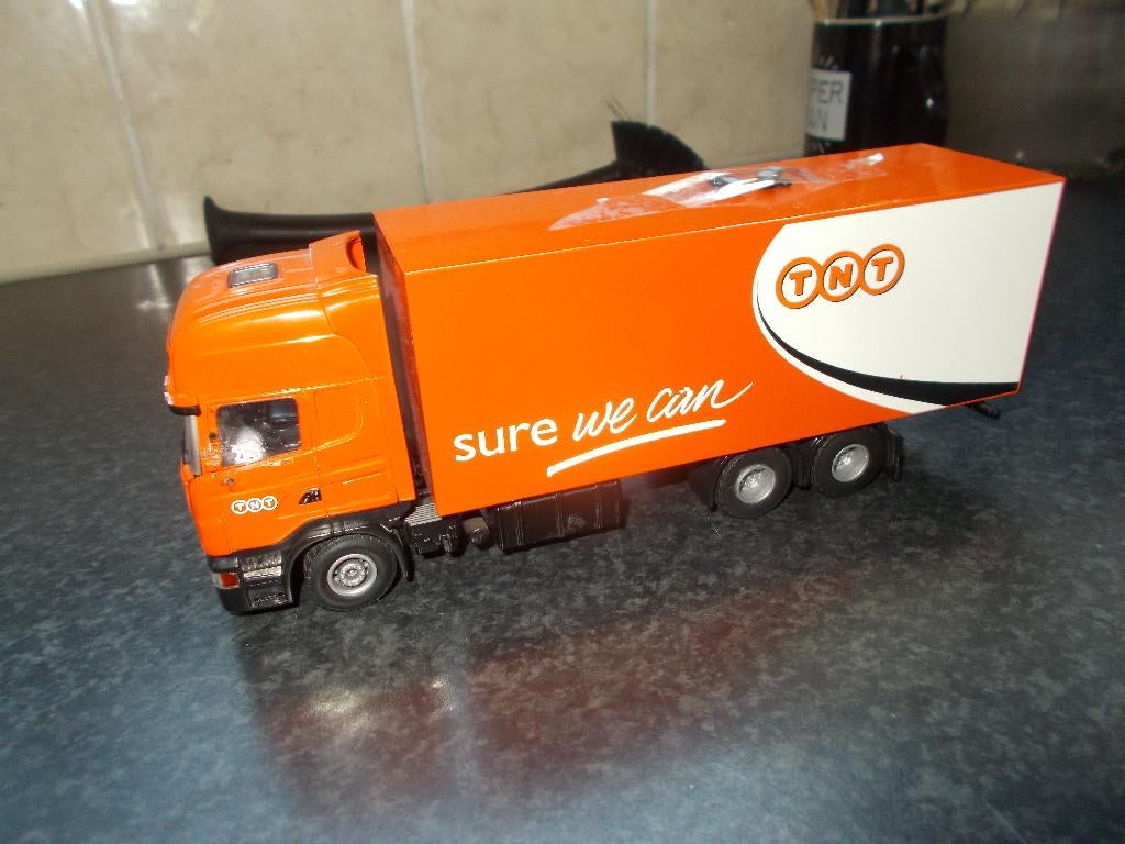 Scania TNT Lion Toys, Ophalen of Verzenden, Zo goed als nieuw, Bus of Vrachtwagen, Lion Toys