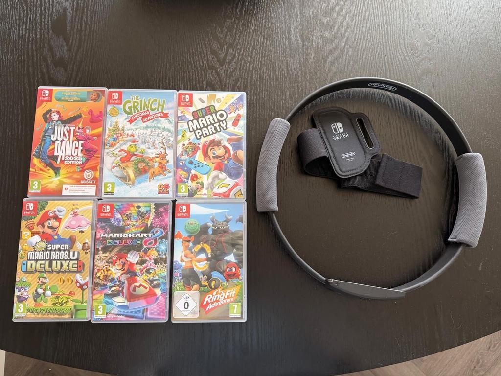 Nintendo Switch OLED met 6 games en Ring Fit Adventure, Ophalen of Verzenden, Gebruikt