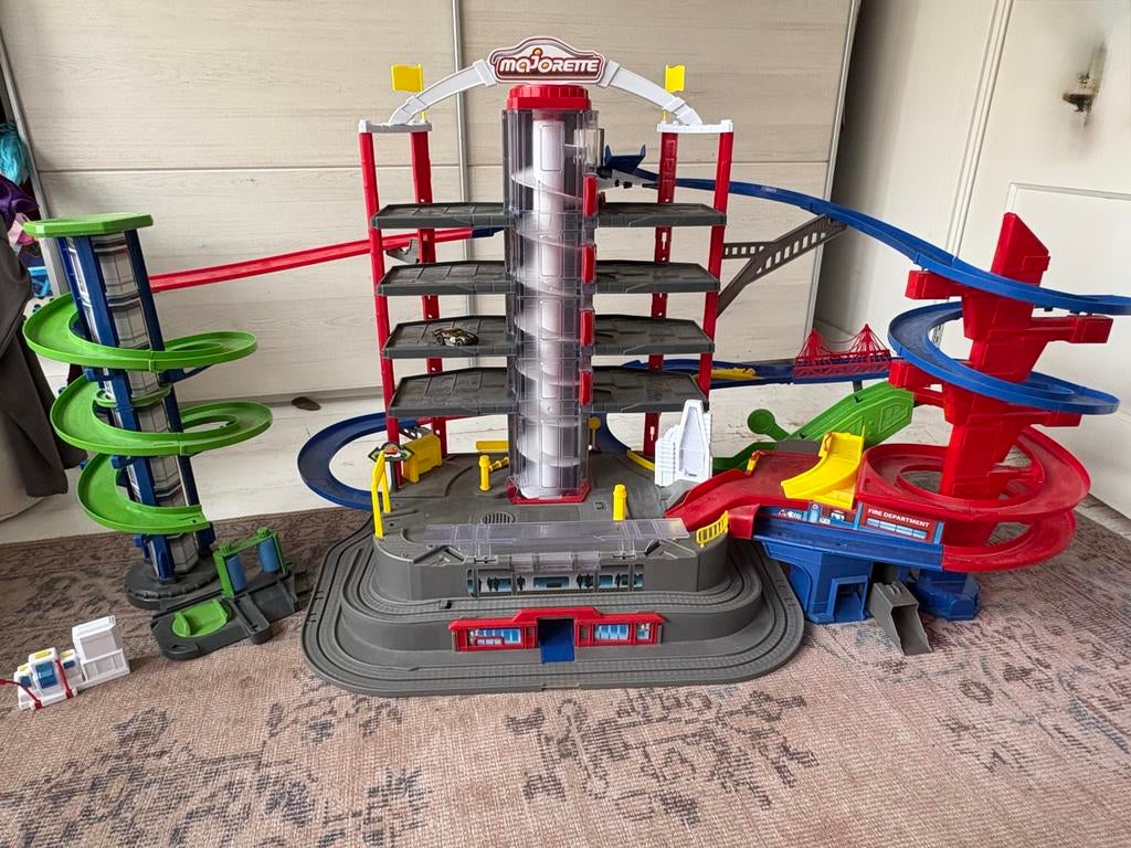 Majorette speelgoedgarage / racebaan met looping, Kinderen en Baby's, Speelgoed | Racebanen, Ophalen, Overige merken, Racebaan