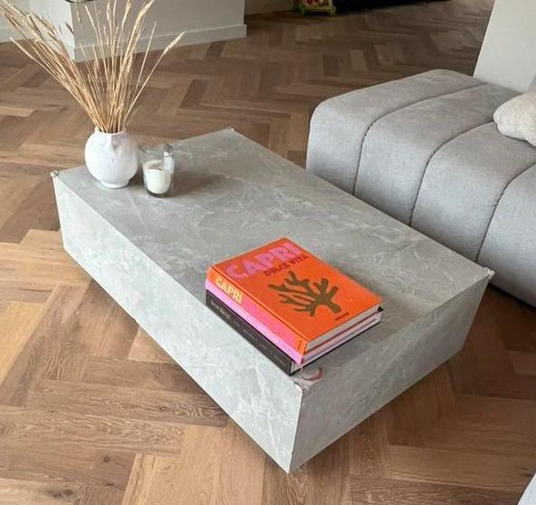 Salontafel Westwing Lesley travertijn look (beschadiging), Huis en Inrichting, Tafels | Salontafels, Zo goed als nieuw, Minder dan 50 cm