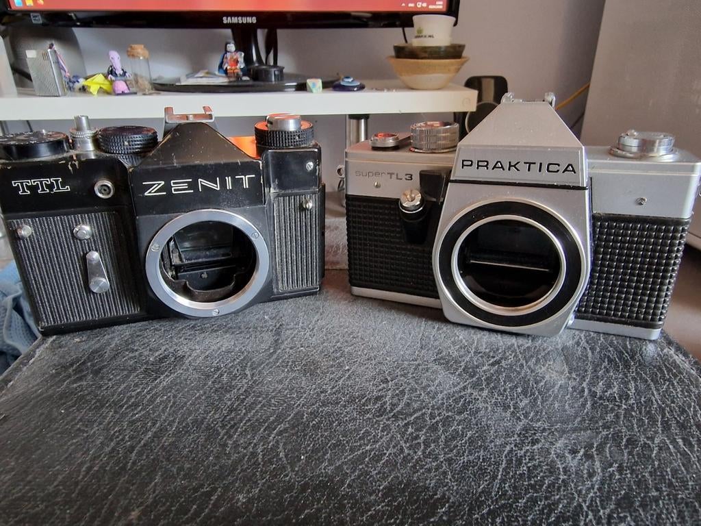 2 defecte analoge camera's - Zenit TTL + Praktica Super TL3, Audio, Tv en Foto, Fotocamera's Analoog, Ophalen of Verzenden, Niet werkend