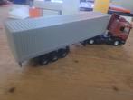 Scania met contener oplegger